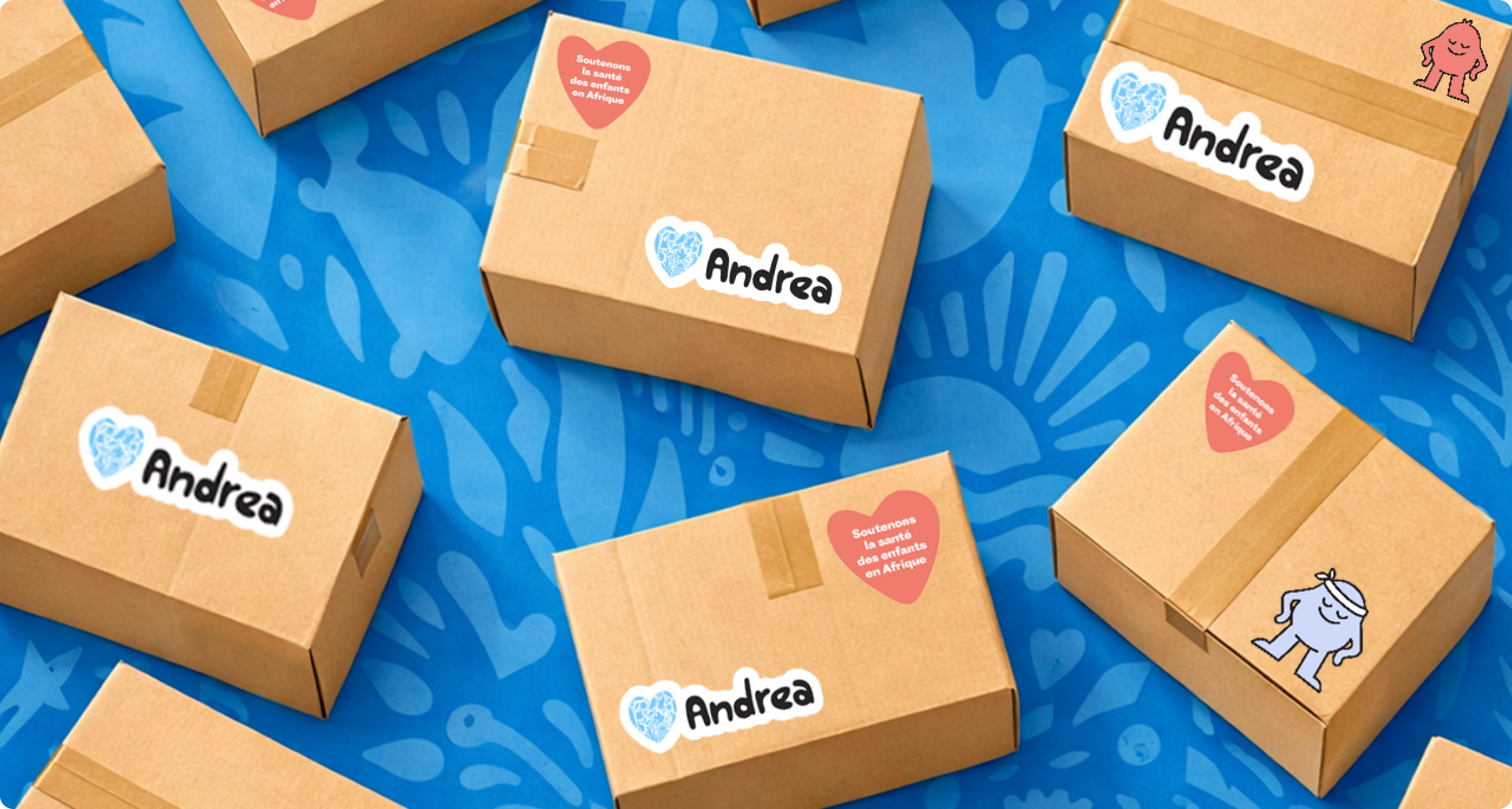 Système de packaging de l'association Andrea Zajac — colis brandés, logo cœur et mascottes sur motif bleu
